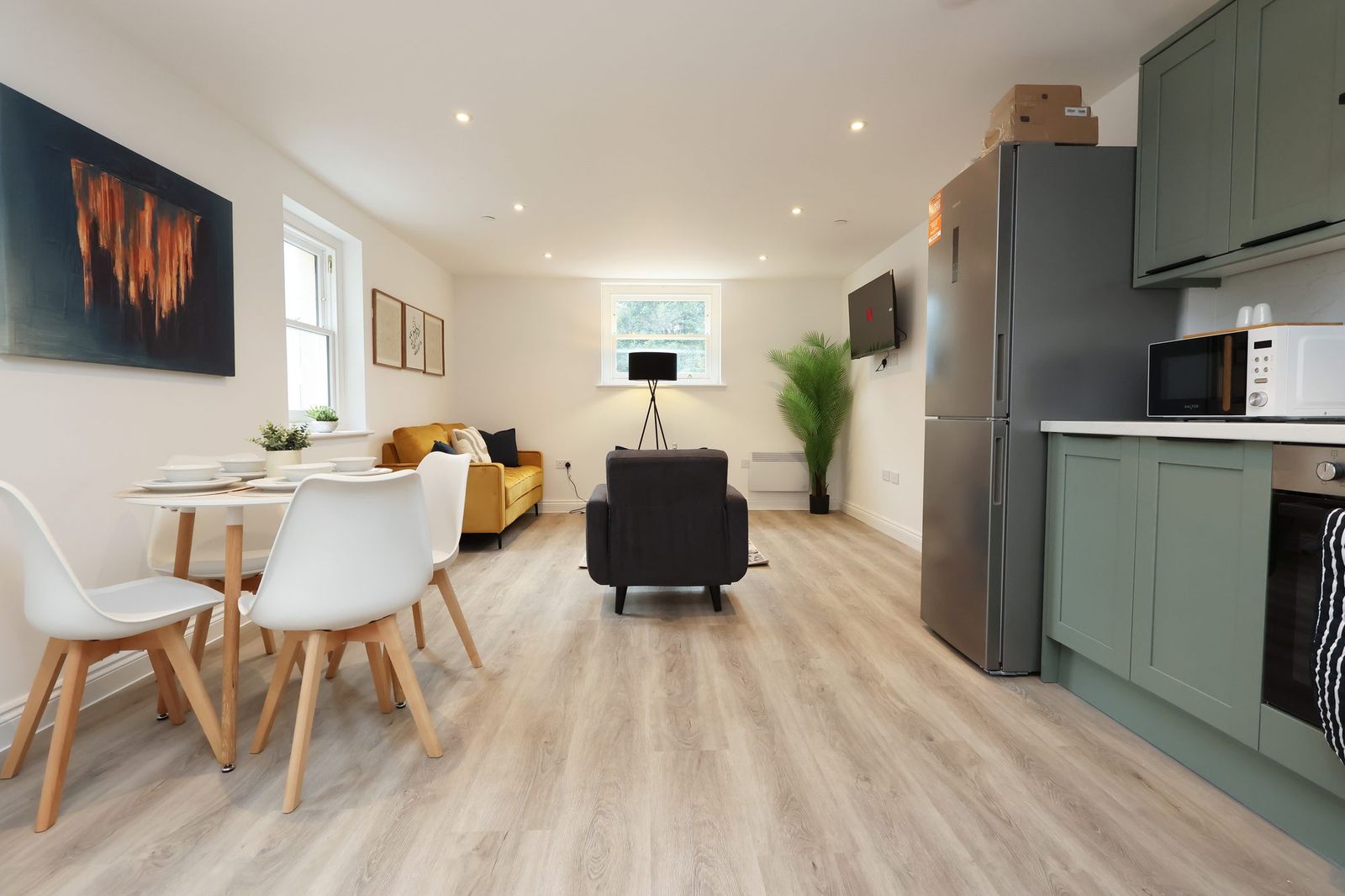 Open-plan living room and kitchen in a Cardiff city centre apartment